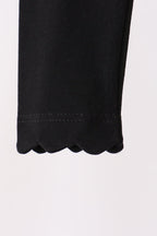 Black scalloped leggings