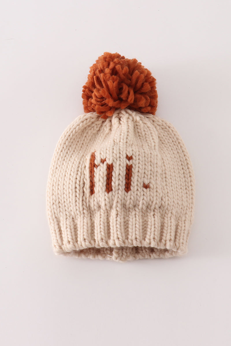 Beige pompom hi cable beanie hat