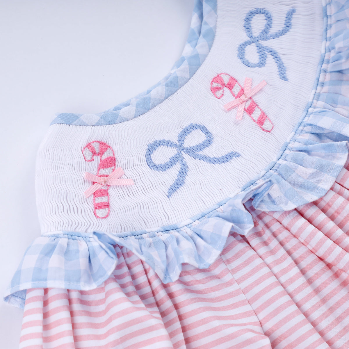 Pink candy cane bow hand smocked ruffle dress